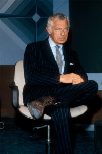 スーツにブーツを合わせているGianni Agnelli