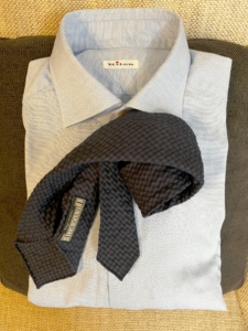 light blue shirt with navy settepieghe tie